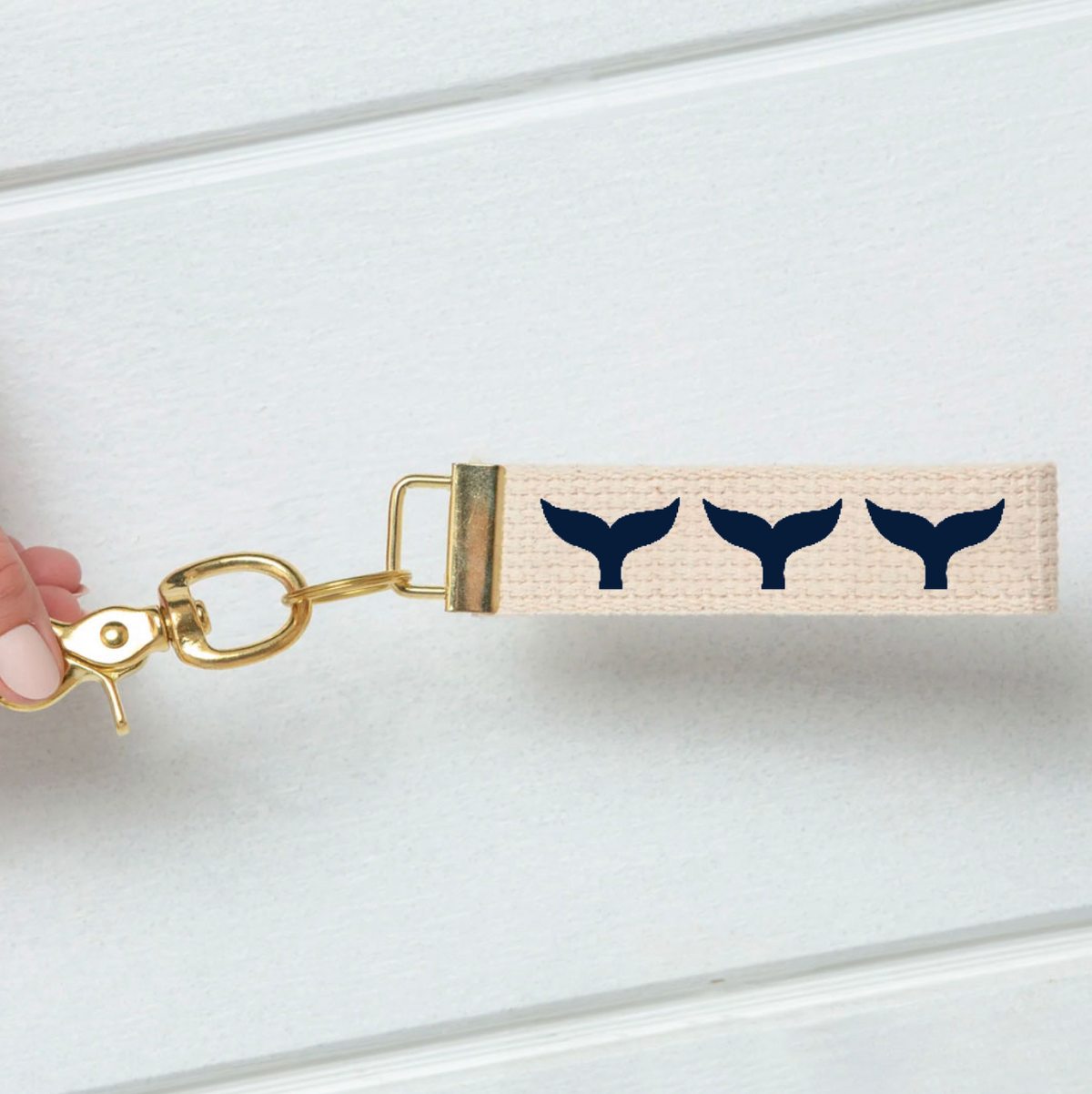 Repeating Whale Tail Keychain